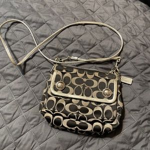 Woman’s coach poppy  black and gray pants